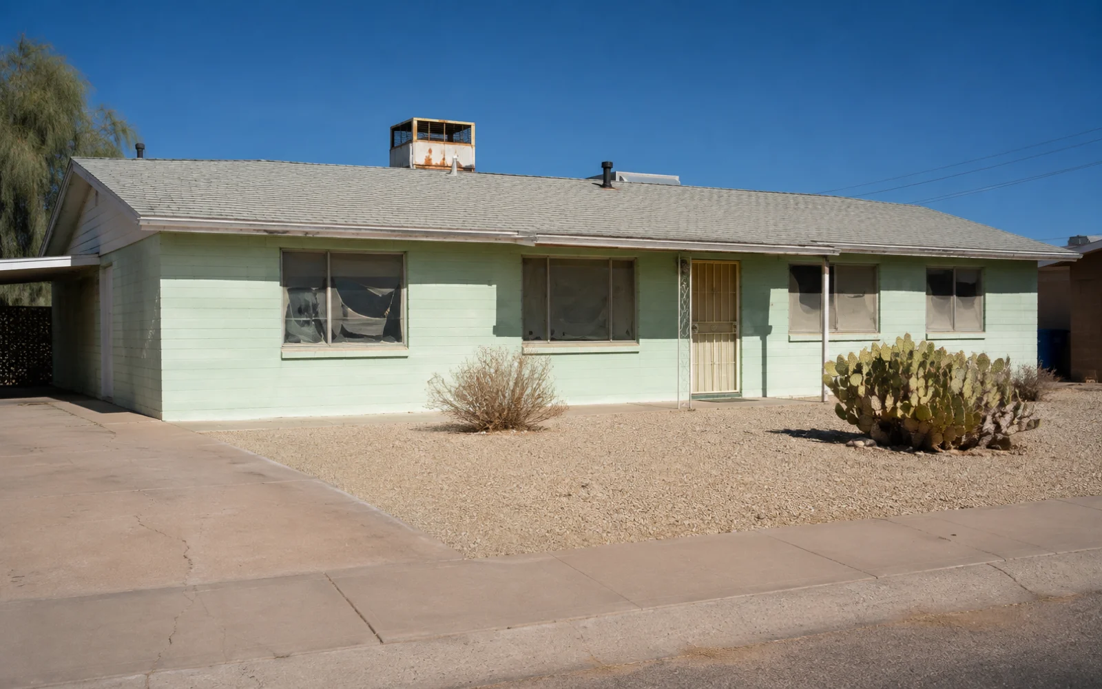 A dated single-story Phoenix ranch house, original condition